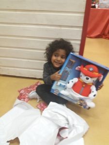 A child who has received items through Giving World