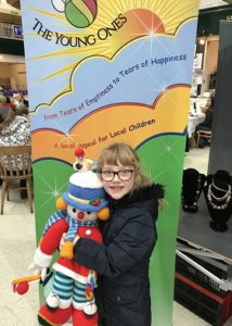 A child who has received items through Giving World